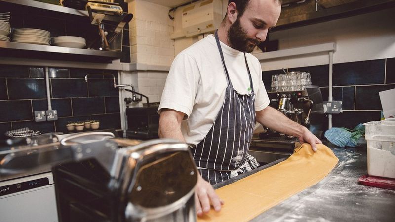 Male chef making pasta